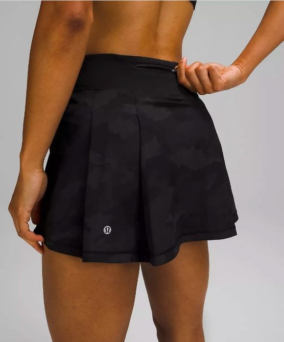 Close-up view of the black skirt