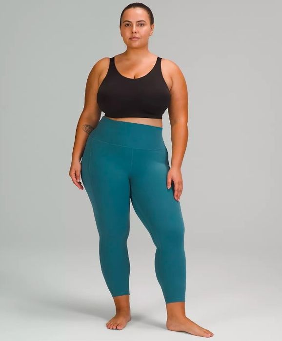 Model showing off the blue leggings