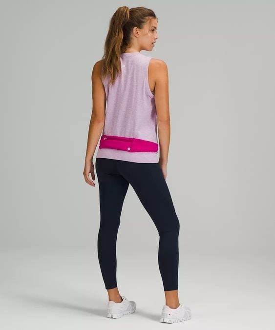 Model showcasing the pink running belt
