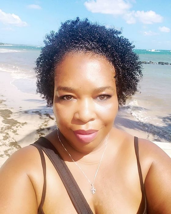 reviewer's photo showcasing their natural curls
