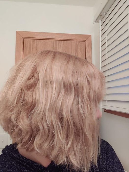 A reviewer’s hair before using the straightening brush