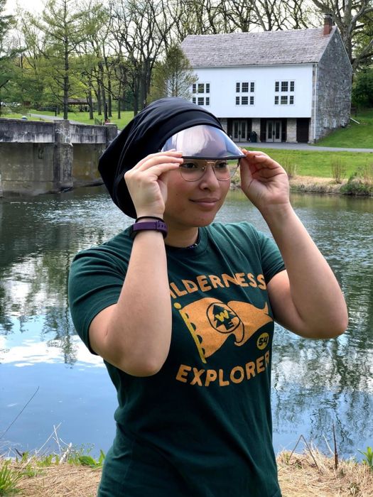 Someone sporting the stylish waterproof hat.
