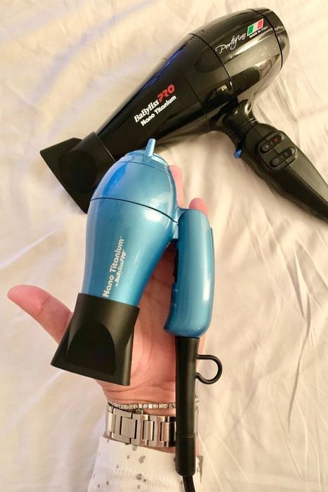 a photo comparing the blow dryer with a regular-sized blow dryer