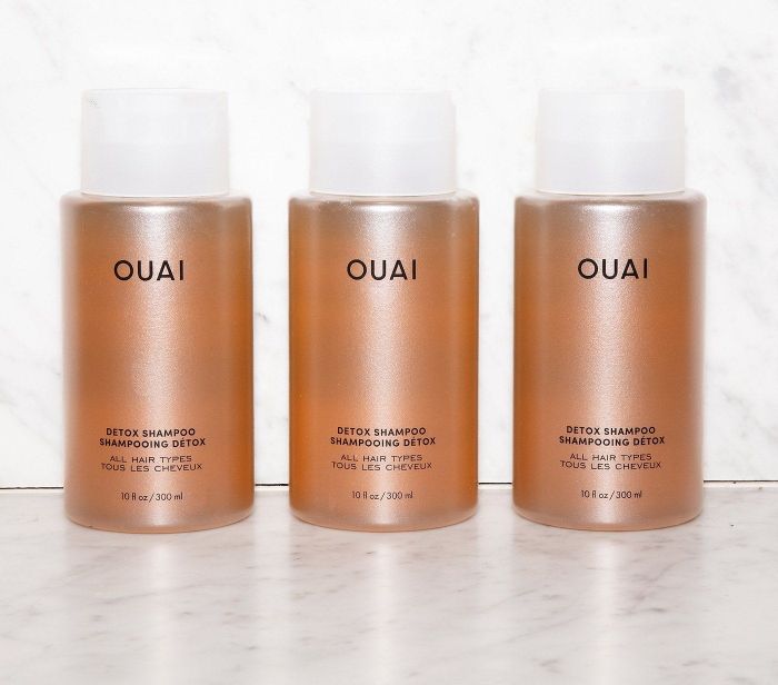 A photo featuring three bottles of the detoxifying shampoo