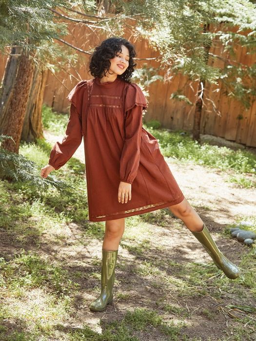 model showcasing the dress in cherry mahogany