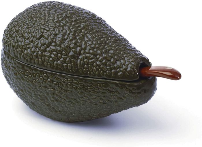 The avocado bowl with its lid placed on top, keeping contents fresh and ready to serve.