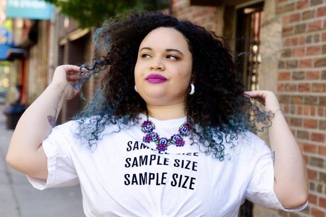 kayla wearing a pinkish-purple matte lipstick