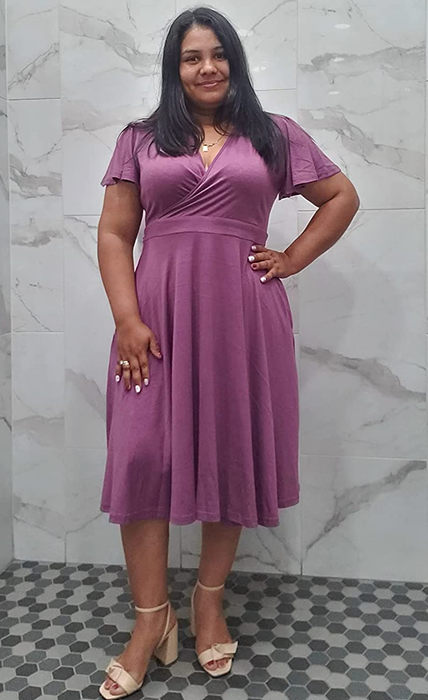 A reviewer rocking the dress in purple.
