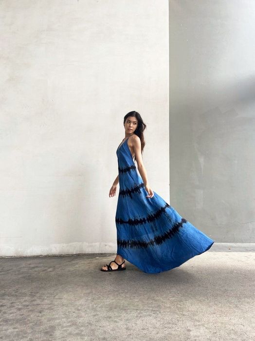 Model wearing a version in black and blue hues.