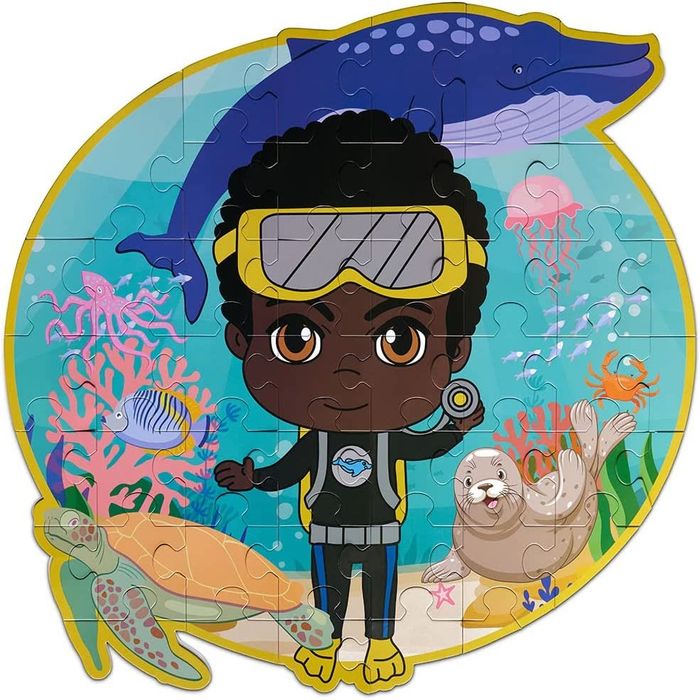 a puzzle featuring a young boy swimming underwater with marine life around him