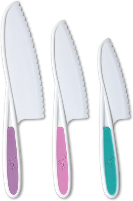 Three plastic knives in purple, pink, and teal, each in different sizes.