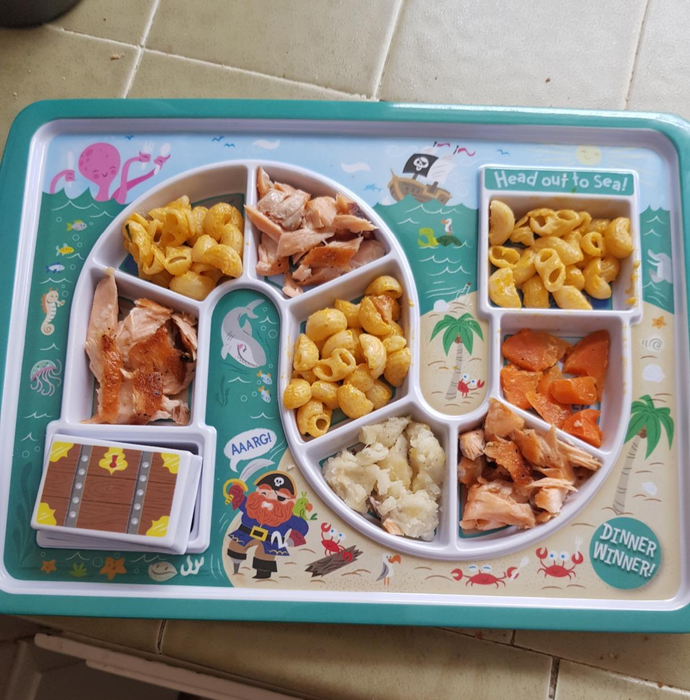 A reviewer's image showcasing a maze-style plate filled with an assortment of different foods.