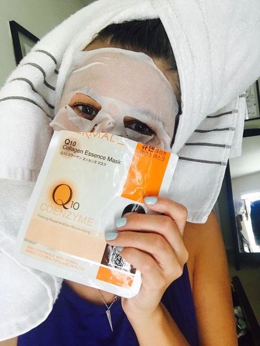 a reviewer wearing a sheet mask