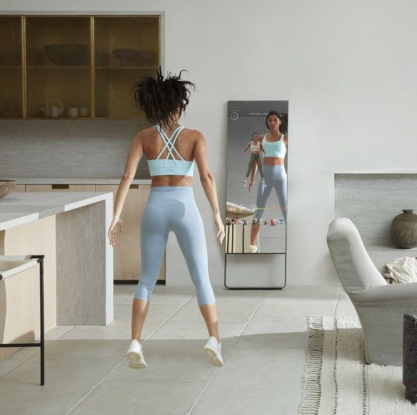 The model using The Mirror for various jumping exercises.