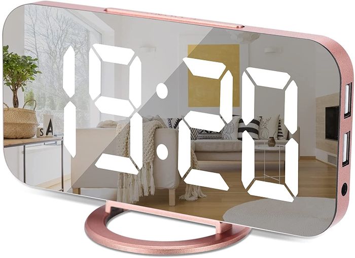 The alarm clock in a chic rose gold finish, perfect for any modern decor.