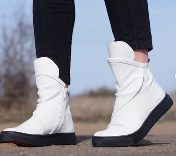 The sneaker boots in a sleek white design