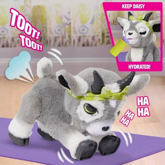 A plush goat toy on a yoga mat, playfully posed with a headband, demonstrating yoga poses