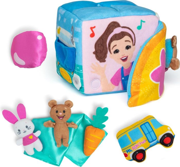 A plush educational toy set that includes a cube adorned with cartoon characters like a bear, a bunny, a carrot, and a toy bus. Perfect for little ones to engage in play.