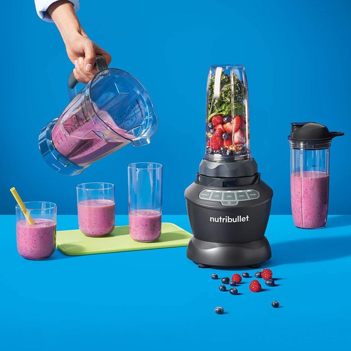The blender set in action, whipping up a fresh smoothie