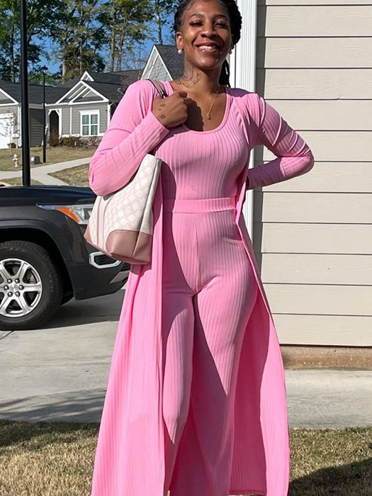 A reviewer sporting a pink ensemble.