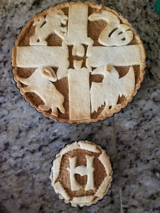 A pie from a reviewer, topped with the iconic Hogwarts crest.