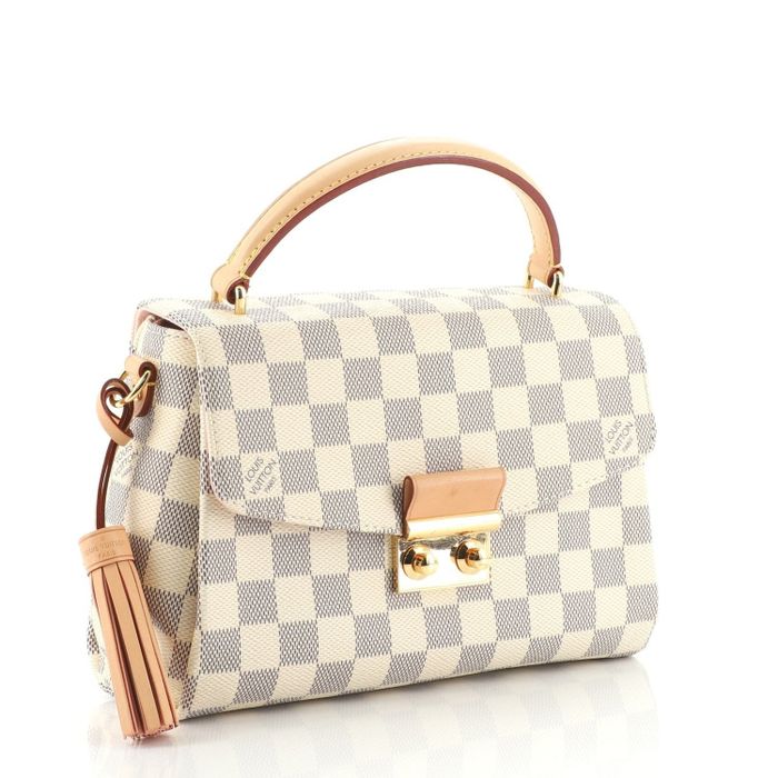A gray and cream checked bag.