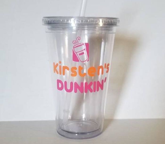 A reusable cup featuring the text Kirsten's Dunkin.