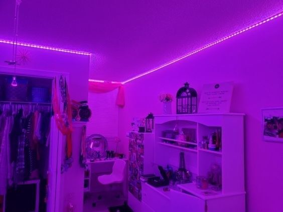 A room bathed in purple light, as seen in the reviewer's space.