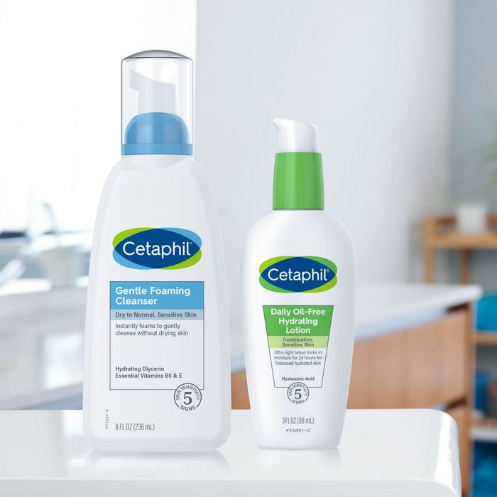 The bottle of Cetaphil gentle foaming cleanser placed on a bathroom counter.