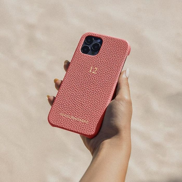 A pink leather iPhone case that adds a touch of elegance.