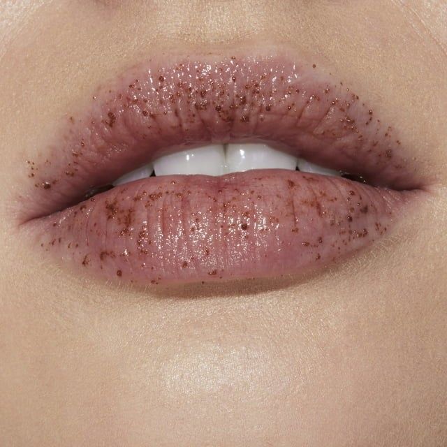 Close-up shot of lips with a glossy, smooth finish