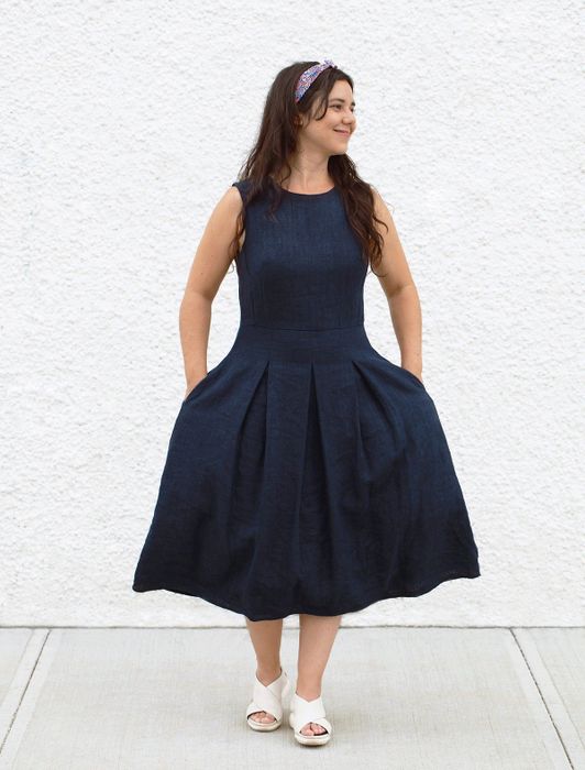 A model showcases the bonbon dress in a cool blue hue.