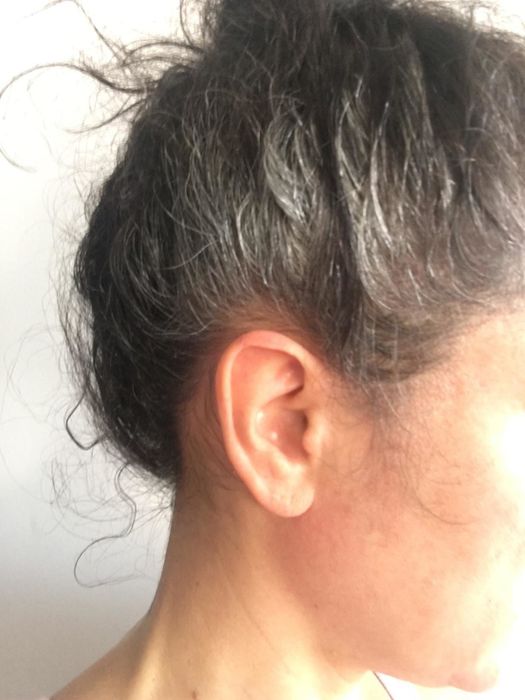 A reviewer’s hair before using the root cover-up spray