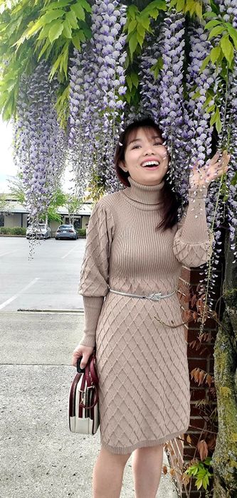 Reviewer wearing the elegant turtleneck dress