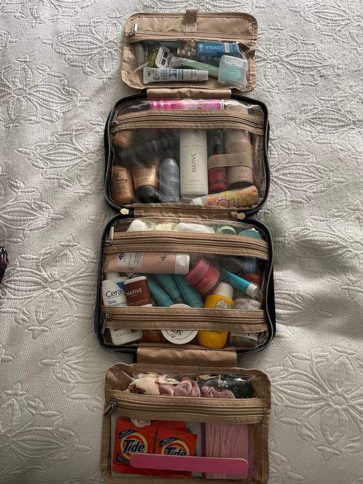 A picture showing the toiletries holder filled with products, each neatly arranged for maximum organization.