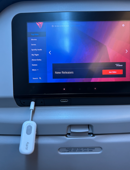 Mytour writer's AirFly plugged into an airplane's in-flight entertainment system.