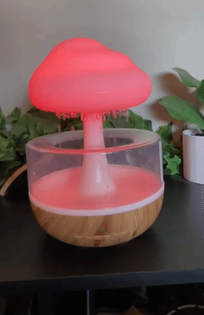 A gif of the rain cloud essential oil diffuser glowing red while in operation.