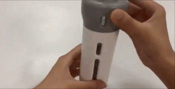 A GIF showing the grey dispenser being opened, revealing four small containers inside that can be filled with your chosen products.