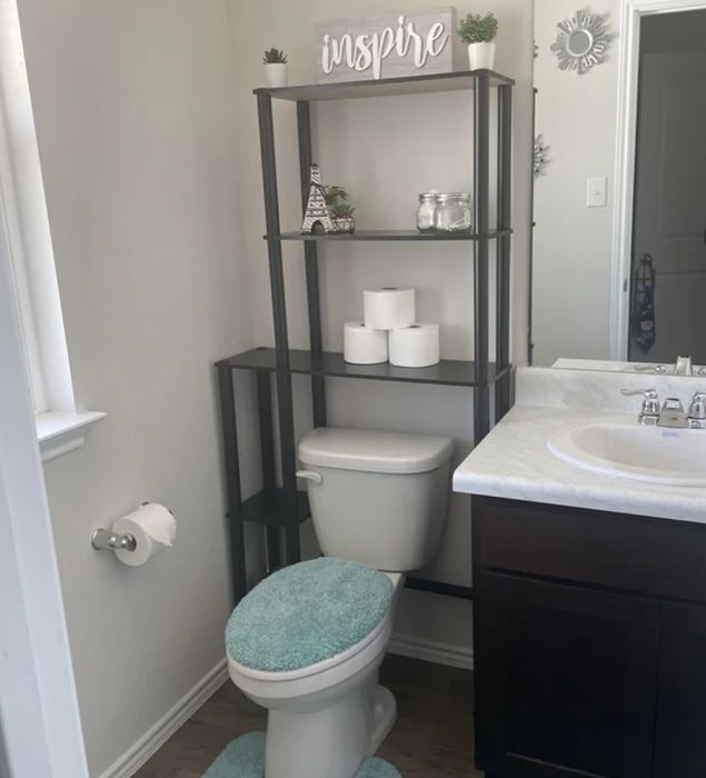 A customer's over-the-toilet storage unit