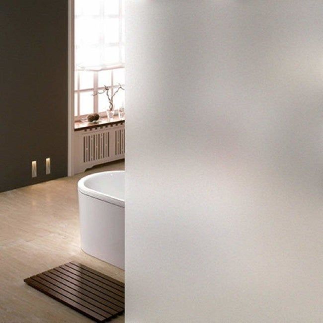 A bathroom featuring frosted glass for added privacy