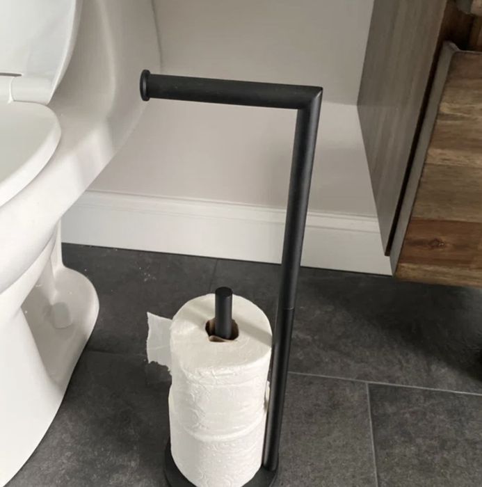 A reviewer's toilet paper holder