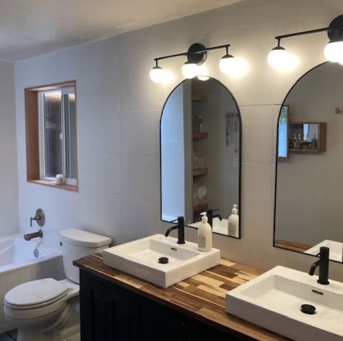 A customer's review of the arched bathroom mirror