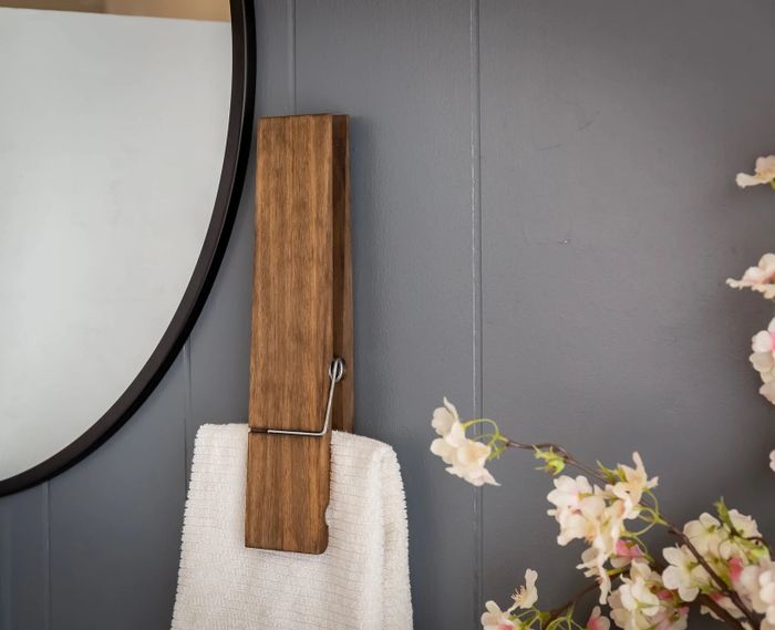 A towel holder designed like a clothespin