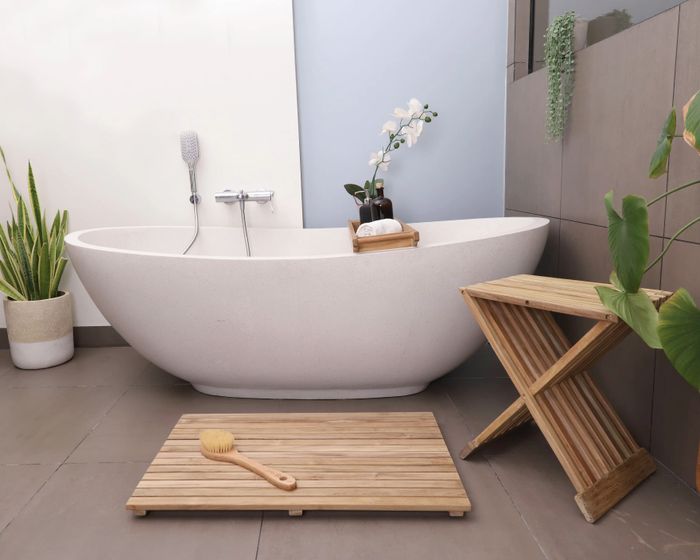 A shower mat made from teak and wood
