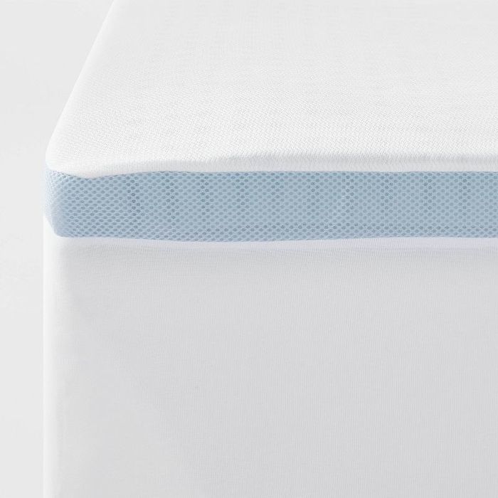 the mattress topper on top of a mattress