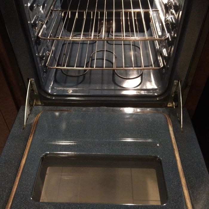 The same oven, now shining and spotless after using the oven cleaner
