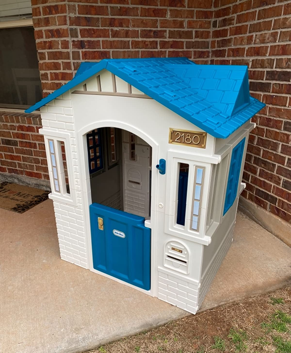 Another reviewer’s image showing the playhouse in an outdoor setting.