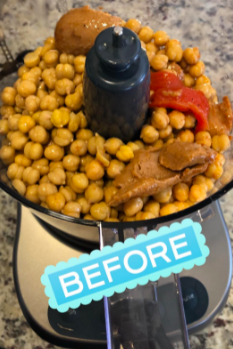 A photo of a reviewer with chickpeas, spread, and pepper placed inside the food processor.