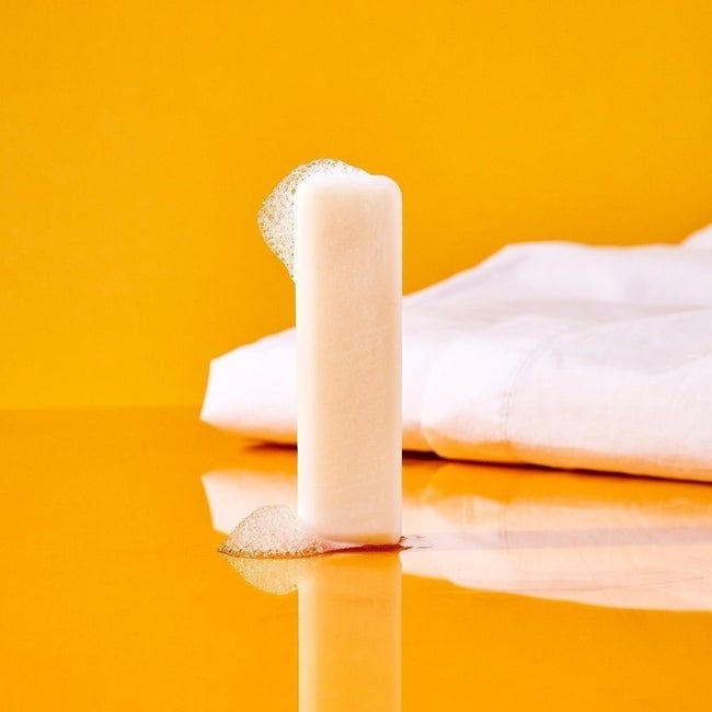 The stick-shaped bar of stain-removing soap