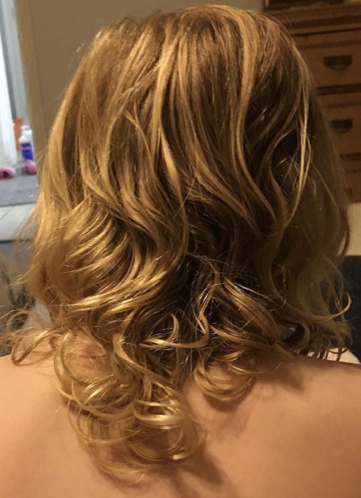 The same child with smooth and untangled ringlets